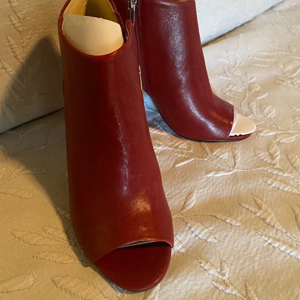 Almost new red peekaboo booties